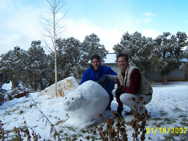 Darren Hanson (left) and Pat Dillon (right) making a snow bear in January 2002