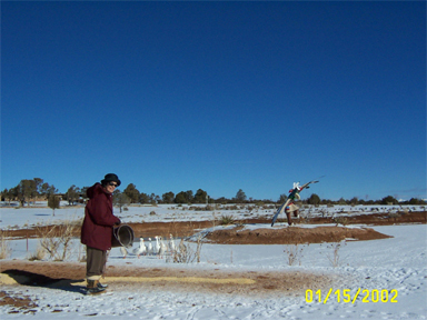 Mary Hanson feeding her ducks and geese in January 2002